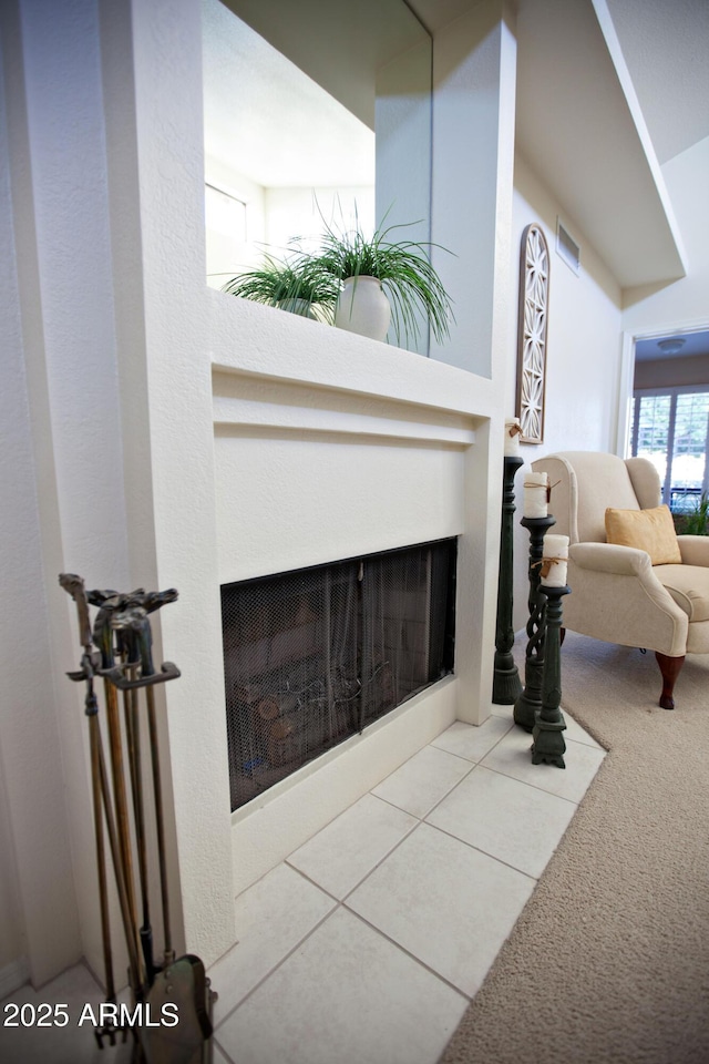 2635 N 62nd St, Mesa, AZ 85215 - living area featuring a fireplace, carpet flooring, and visible vents