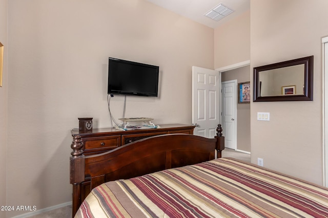 bedroom with light carpet