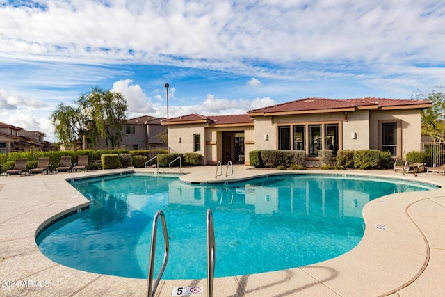 view of pool featuring a patio