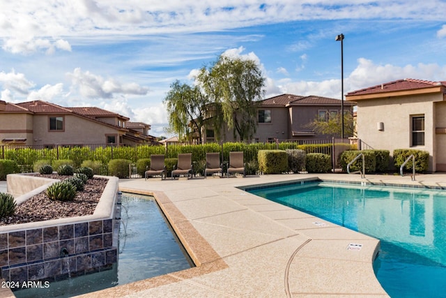 view of pool with a patio