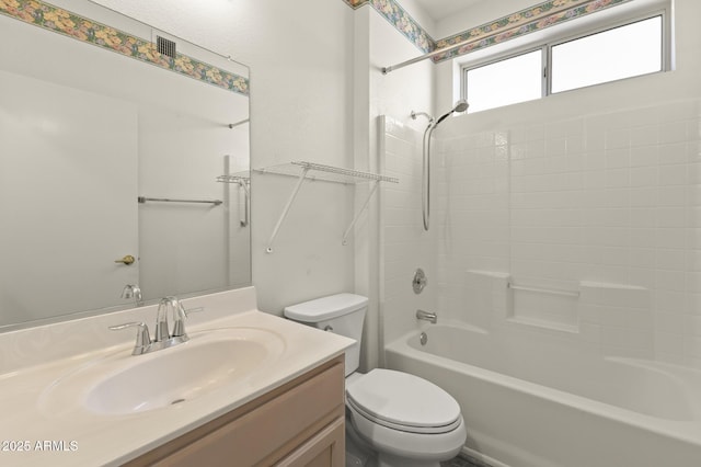 full bathroom with toilet, vanity, and bathtub / shower combination