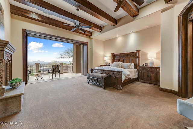 carpeted bedroom featuring access to exterior, a ceiling fan, baseboards, and beam ceiling