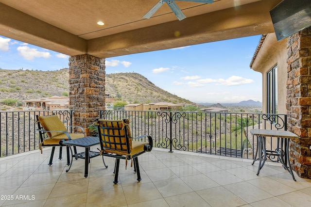 balcony featuring a mountain view