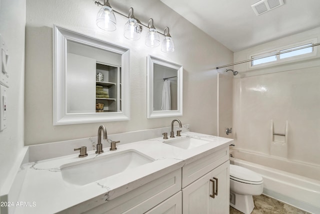 bathroom featuring double vanity, shower / washtub combination, a sink, and visible vents