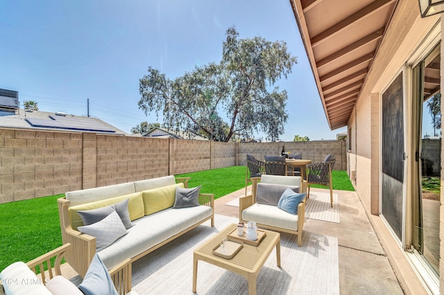 view of patio / terrace with outdoor dining area, a fenced backyard, and an outdoor living space