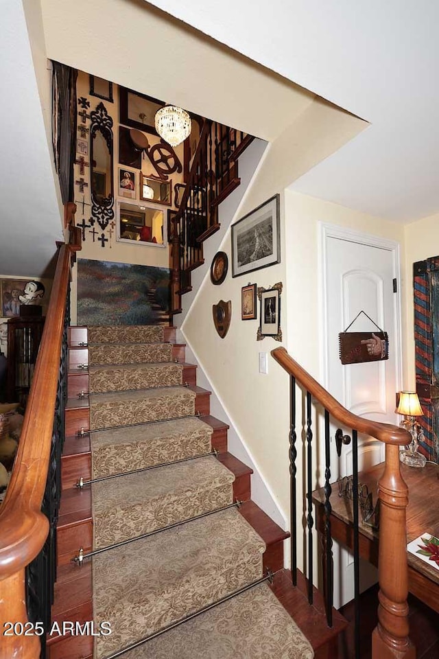 4317 N 70th St, Scottsdale, AZ 85251 - stairway with wood finished floors and baseboards