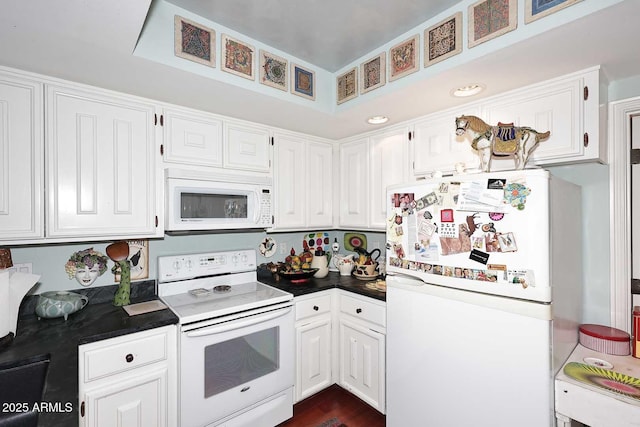 4317 N 70th St, Scottsdale, AZ 85251 - kitchen with white appliances, dark countertops, and white cabinetry