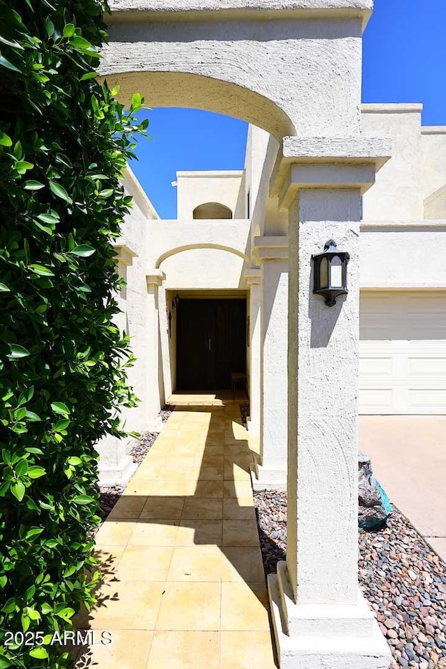 4317 N 70th St, Scottsdale, AZ 85251 - doorway to property featuring stucco siding