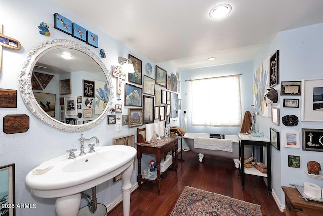 4317 N 70th St, Scottsdale, AZ 85251 - full bath with wood-type flooring, a freestanding tub, and recessed lighting