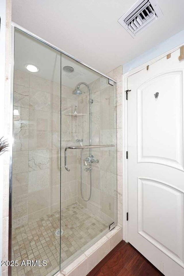 4317 N 70th St, Scottsdale, AZ 85251 - full bath featuring wood finished floors and a stall shower