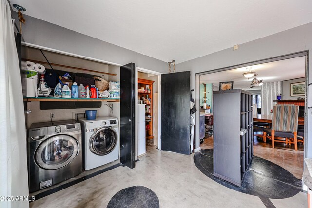 laundry area featuring laundry area and washer and clothes dryer
