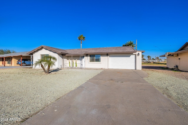 ranch-style home with a garage