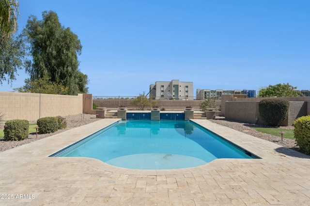 view of pool with a fenced backyard, a fenced in pool, and a patio area