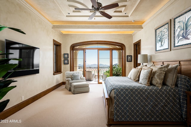 bedroom featuring carpet, ceiling fan, a raised ceiling, access to outside, and ornamental molding