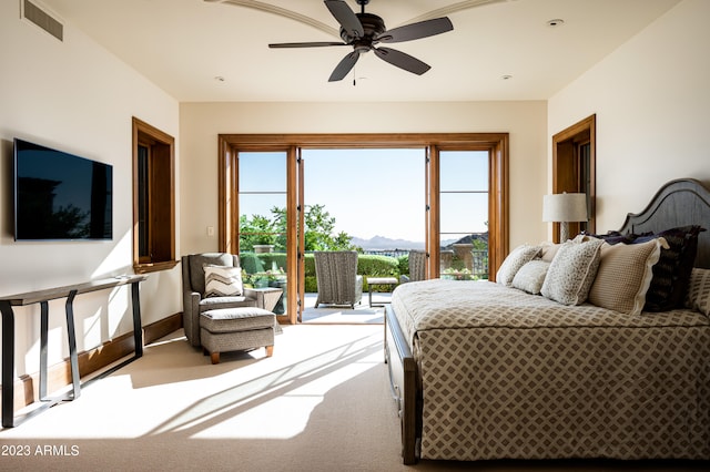 bedroom featuring carpet, access to exterior, and ceiling fan