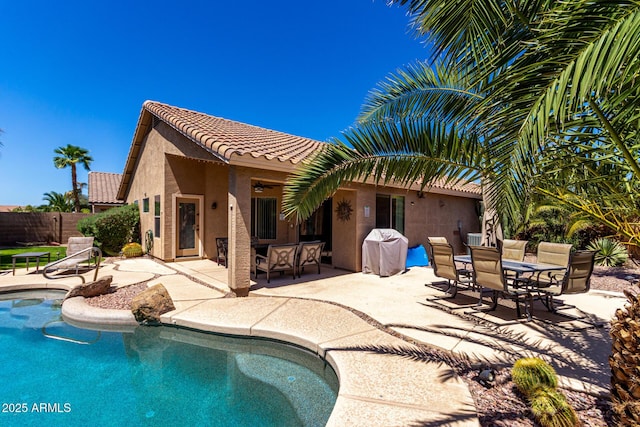 553 W Hereford Dr, San Tan Valley, AZ 85143 - view of pool with a patio area, outdoor dining space, a fenced in pool, and fence