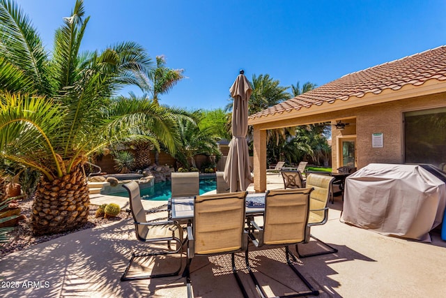 553 W Hereford Dr, San Tan Valley, AZ 85143 - view of patio / terrace featuring grilling area, a fenced in pool, a hot tub, and outdoor dining area