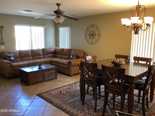 553 W Hereford Dr, San Tan Valley, AZ 85143 - dining room with visible vents, light tile patterned flooring, and ceiling fan with notable chandelier