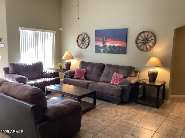 553 W Hereford Dr, San Tan Valley, AZ 85143 - living area with baseboards, a high ceiling, and light tile patterned flooring