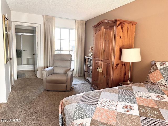 carpeted bedroom featuring a textured ceiling