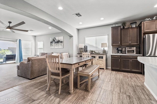 dining area with ceiling fan