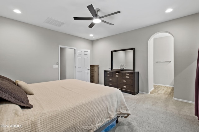 carpeted bedroom featuring ceiling fan