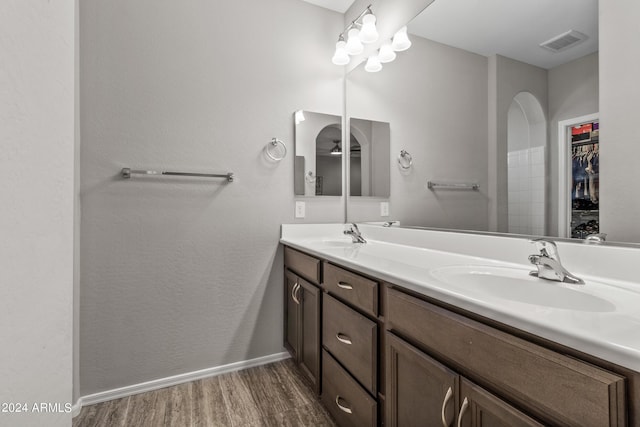 bathroom featuring vanity and hardwood / wood-style floors