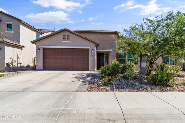 view of front of property featuring a garage