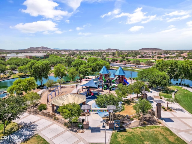 birds eye view of property featuring a water and mountain view