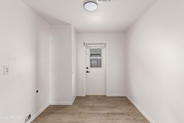 hall featuring light hardwood / wood-style floors