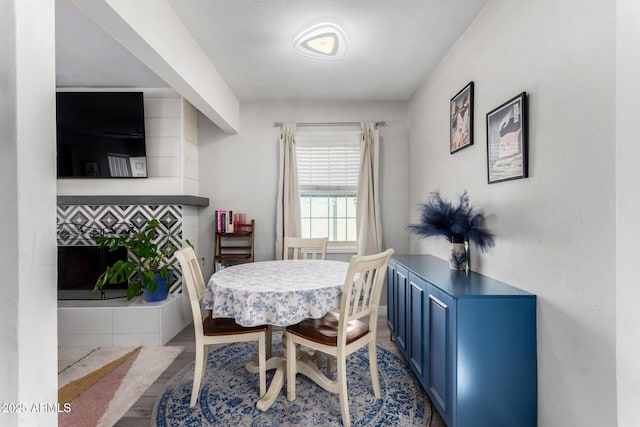 dining room with hardwood / wood-style flooring