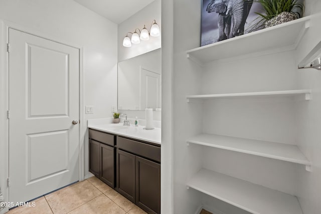 bathroom featuring vanity and tile patterned flooring