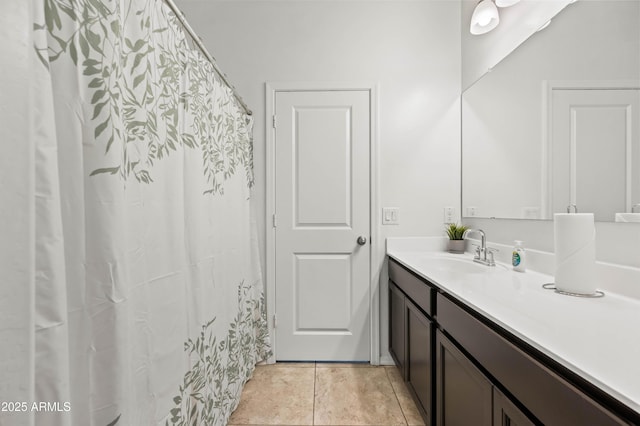 full bathroom with tile patterned flooring and vanity