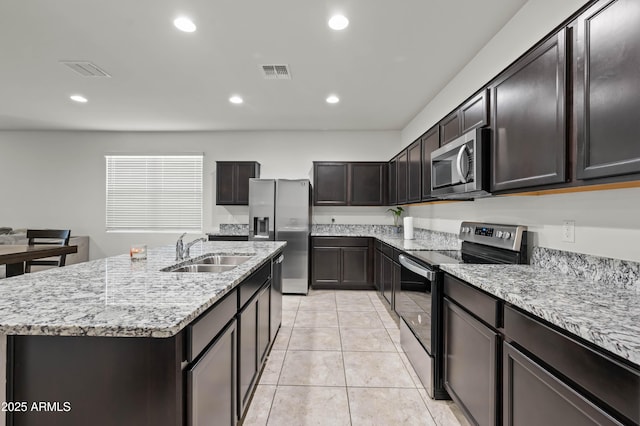 kitchen with visible vents, recessed lighting, stainless steel appliances, and a sink