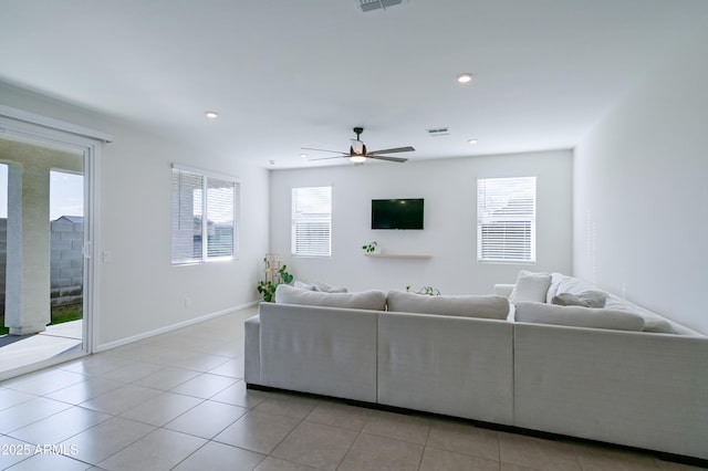 living area featuring recessed lighting, visible vents, ceiling fan, and light tile patterned flooring