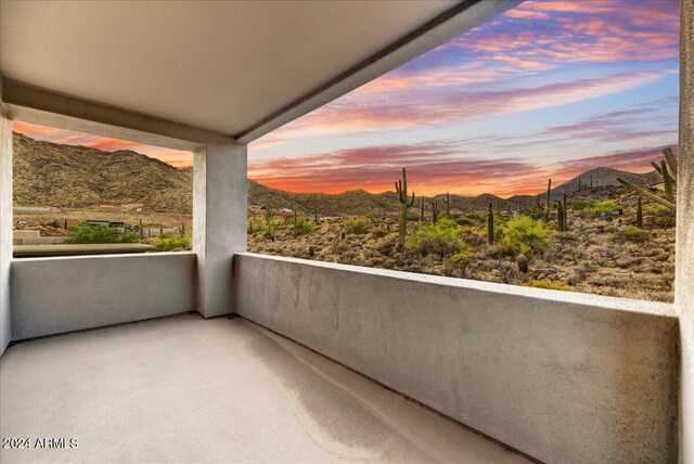 tiled living room with ceiling fan