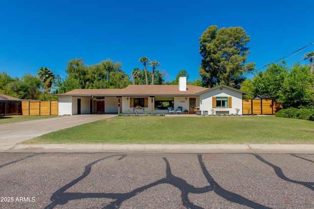 5814 N 11th Ave, Phoenix, AZ 85013 - ranch-style house with driveway, a carport, a porch, and a chimney