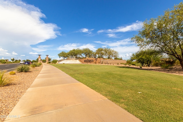 surrounding community with a yard