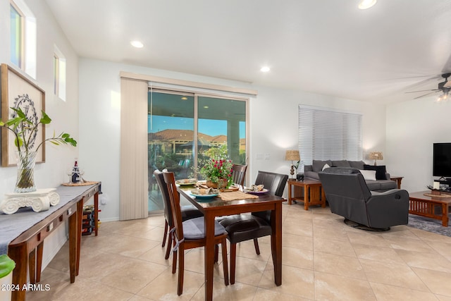 dining room with ceiling fan and light tile patterned floors