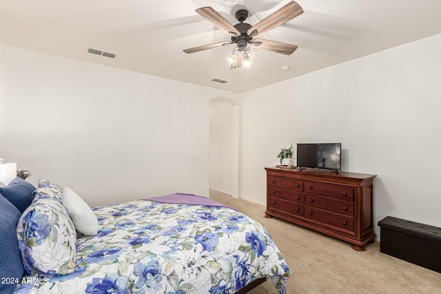 carpeted bedroom featuring ceiling fan