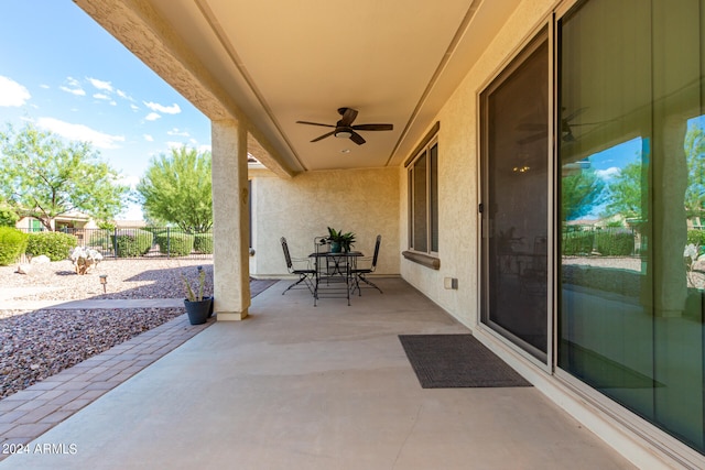 view of patio / terrace featuring ceiling fan