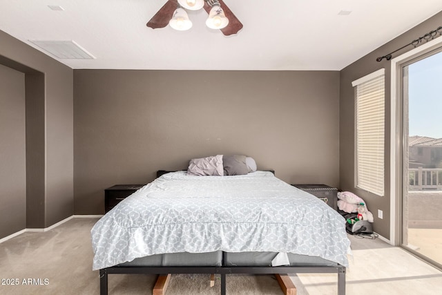 bedroom featuring visible vents, a ceiling fan, carpet flooring, baseboards, and access to exterior