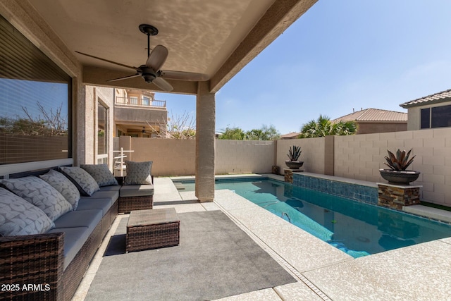 view of pool featuring a patio, a ceiling fan, a fenced in pool, a fenced backyard, and an outdoor hangout area