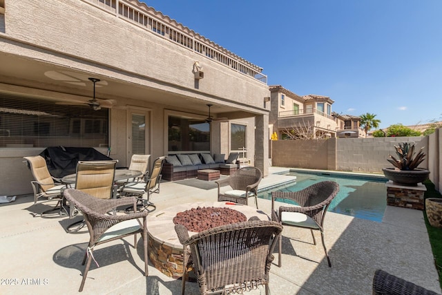 view of patio / terrace with an outdoor living space, a fenced in pool, a grill, and a fenced backyard