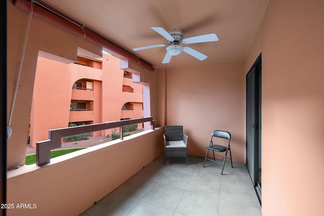balcony featuring a ceiling fan