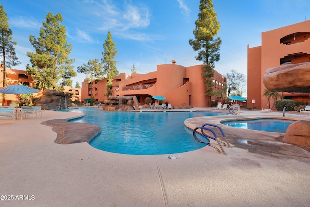community pool with a patio