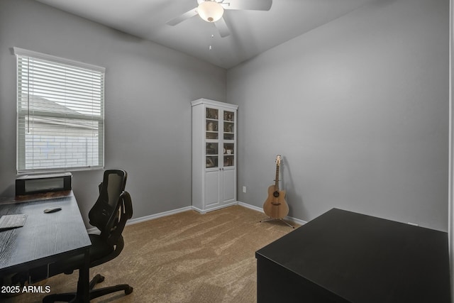 office space featuring light colored carpet and ceiling fan