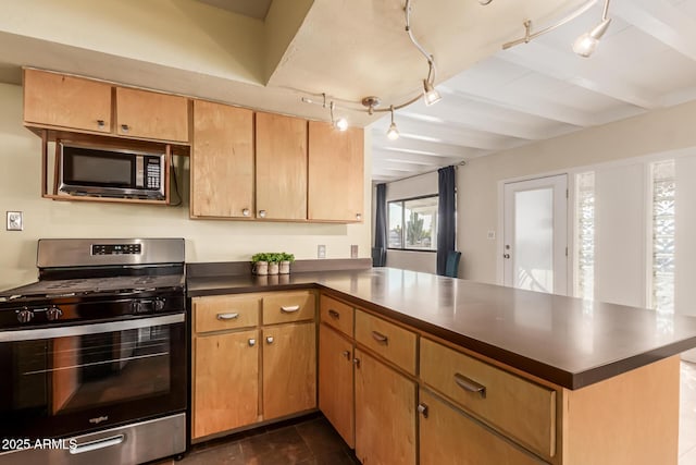 kitchen with stainless steel appliances, beam ceiling, and kitchen peninsula