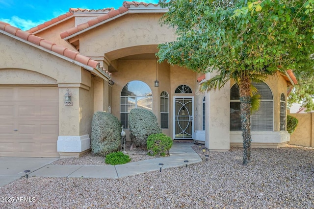 entrance to property featuring a garage