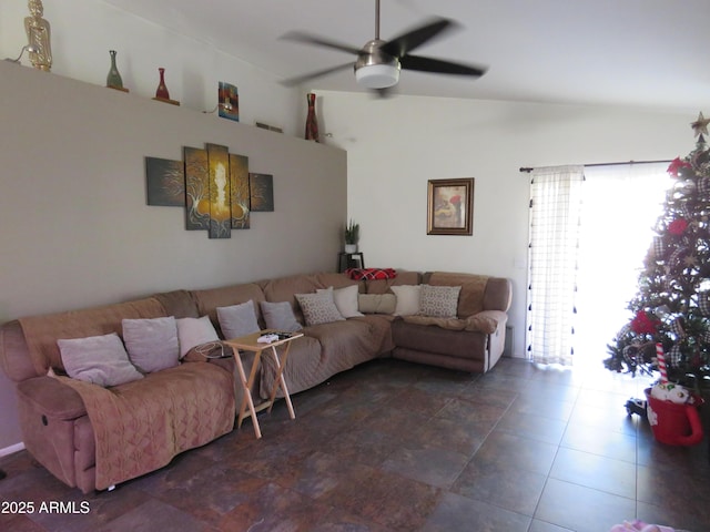 living room with ceiling fan and lofted ceiling